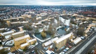 Snow on the rooftops of the iconic AU yellow-brick buildings in the Aarhus University Park Nov 2022. Photo: Abhushan; Source: Facebook;