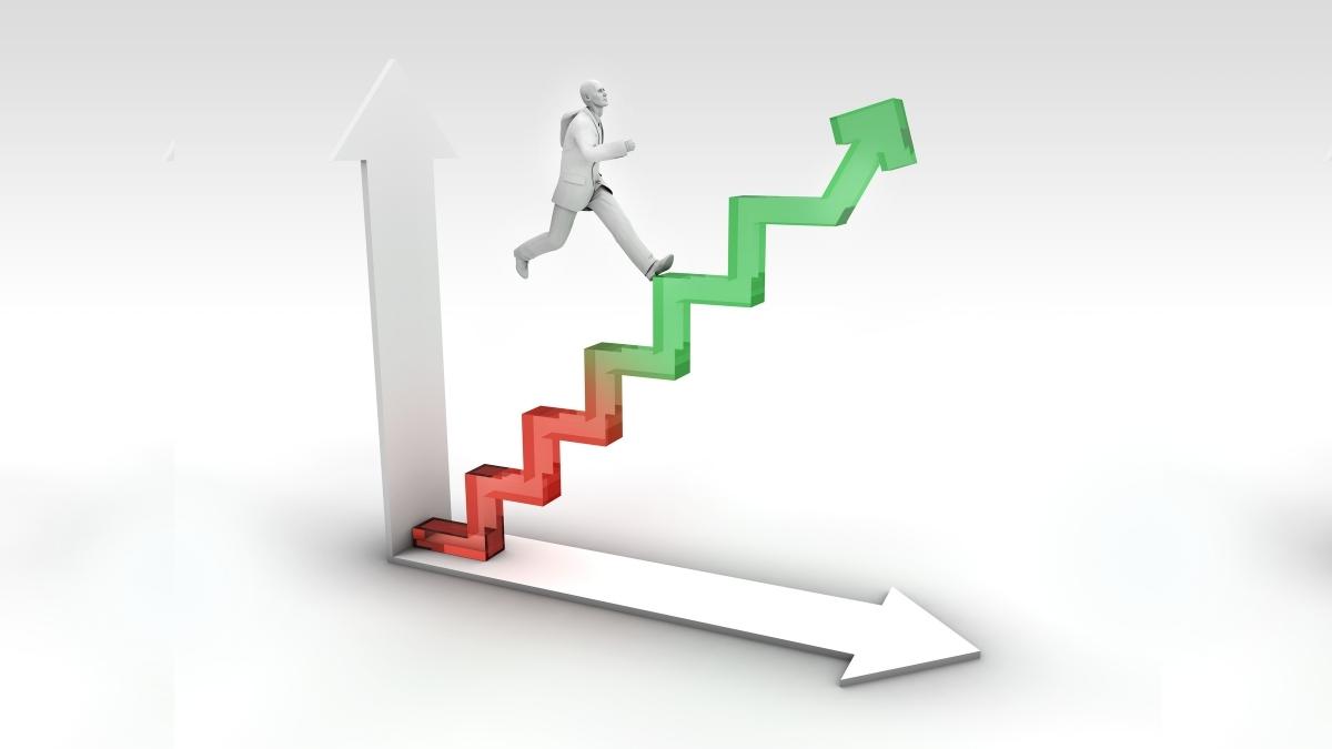 A man step up in the growth ladder representing the job positions'